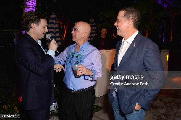 Jason Binn, Paul Shaffer, and Mayor of Miami Beach Philip Levine give a speech at DuJour's Jason Binn And WellNEST Celebrate Miami Beach's Art Basel...