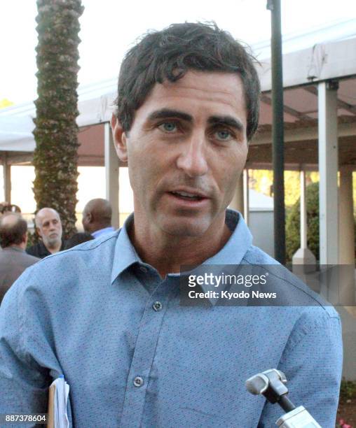 File photo taken in Nov. 13 shows San Diego Padres general manager A.J. Preller talking about Japanese pitcher-slugger Shohei Ohtani in Orlando,...