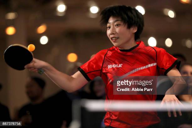 Rio Table Tennis Olympian Jennifer Wu competes in the pro table tennis tournament during the TopSpin charity fundraiser at the Metropolitan Pavilion...