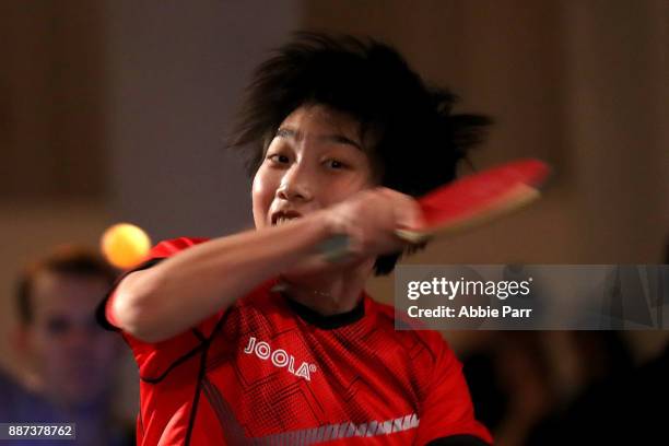 Rio Table Tennis Olympian Jennifer Wu competes in the pro table tennis tournament during the TopSpin charity fundraiser at the Metropolitan Pavilion...