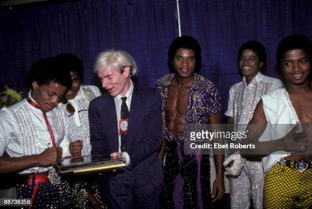 Andy Warholwith the Jacksons, Marlon Jackson, Tito Jackson, Andy Warhol, Jackie Jackson, Michael Jackson and Randy Jackson, at Madison Square Garden...