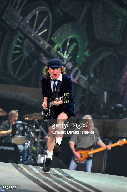 Phil Rudd, Angus Young and Cliff Williams of AC/DC perform on stage at Amsterdam Arena on June 23, 2009 in Amsterdam, Netherlands.