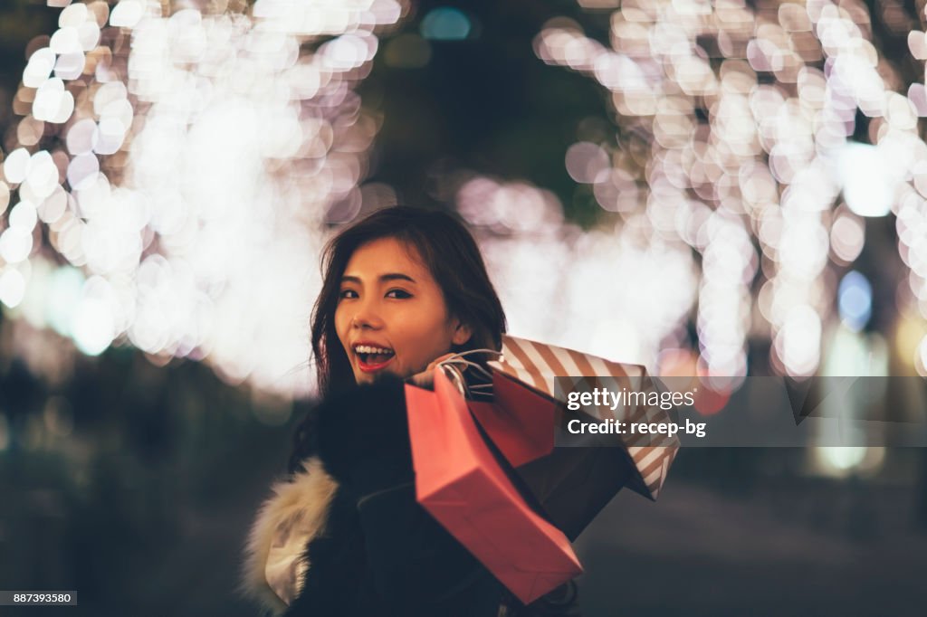 Japanese Woman With Shopping Bags