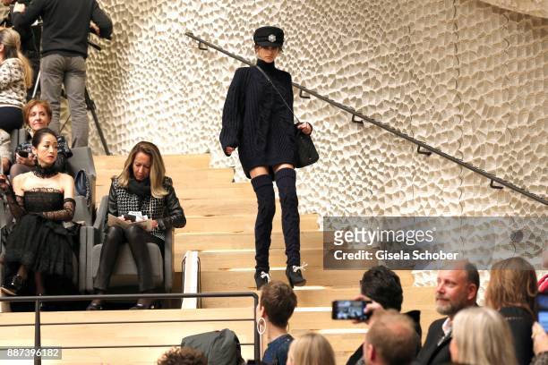 Model Kaia Gerber, daughter of Cindy Crawford during the Chanel "Trombinoscope" collection Metiers d'Art 2017/18 fashion show at Elbphilharmonie on...