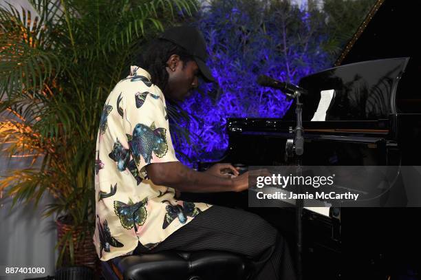 Devonte Hynes performs during the Artsy Projects Miami x Gucci: Special Thanks to Bombay Sapphire at The Bath Club on December 6, 2017 in Miami...