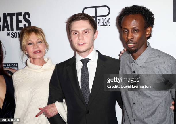 Actors Melanie Griffith, Evan Peters and Barkhad Abdi attend the premiere of Front Row Filmed Entertainment's "The Pirates of Somalia" at TCL Chinese...