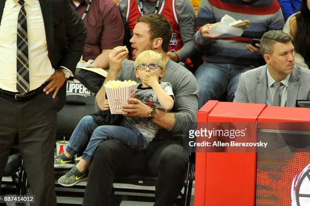 Actor Chris Pratt and son Jack Pratt attend a basketball game between the Los Angeles Clippers and the Minnesota Timberwolves at Staples Center on...
