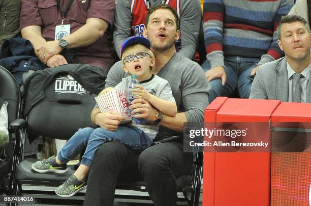 Actor Chris Pratt and son Jack Pratt attend a basketball game between the Los Angeles Clippers and the Minnesota Timberwolves at Staples Center on...