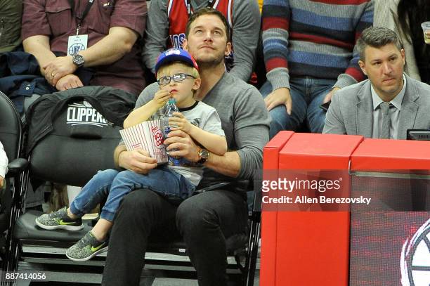 Actor Chris Pratt and son Jack Pratt attend a basketball game between the Los Angeles Clippers and the Minnesota Timberwolves at Staples Center on...