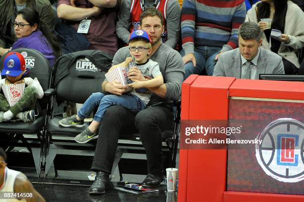 Actor Chris Pratt and son Jack Pratt attend a basketball game between the Los Angeles Clippers and the Minnesota Timberwolves at Staples Center on...