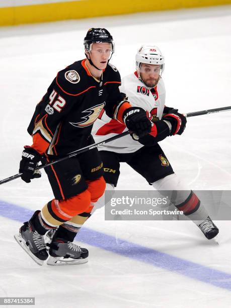 Anaheim Ducks defenseman Josh Manson in action with Ottawa Senators center Gabriel Dumont in the third period of a game played on December 6, 2017 at...