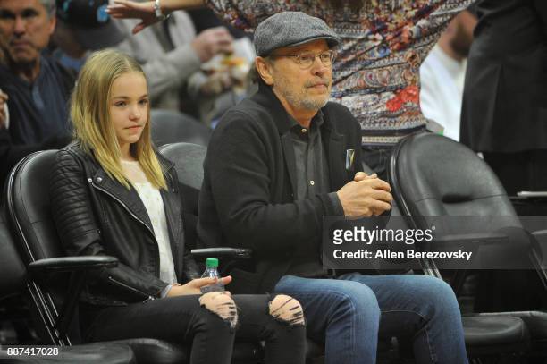 Actor Billy Crystal attends a basketball game between the Los Angeles Clippers and the Minnesota Timberwolves at Staples Center on December 6, 2017...