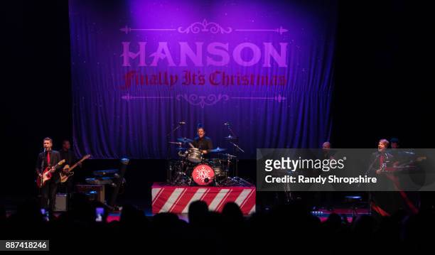 Isaac Hanson, Zac Hanson and Taylor Hanson of the band Hanson performs on stage at The Wiltern on December 6, 2017 in Los Angeles, California.