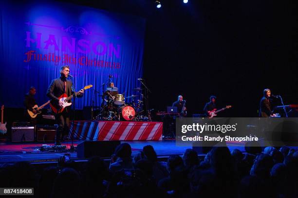 Isaac Hanson, Zac Hanson and Taylor Hanson of the band Hanson performs on stage at The Wiltern on December 6, 2017 in Los Angeles, California.