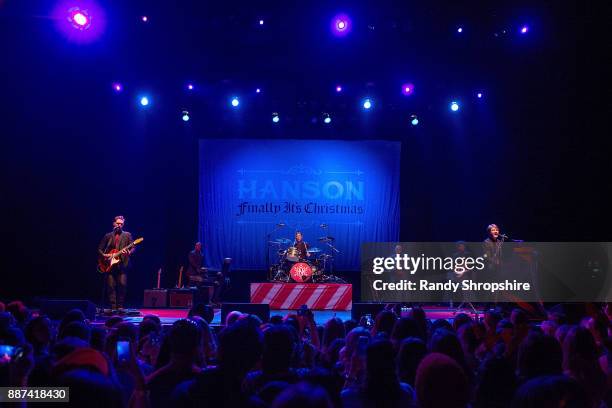 Isaac Hanson, Zac Hanson and Taylor Hanson of the band Hanson performs on stage at The Wiltern on December 6, 2017 in Los Angeles, California.