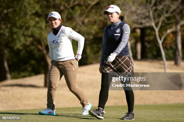 Minami Katsu and Hikaru Yoshimoto of Japan talks during the first round of the LPGA Rookie Tournament at Great Island Club on December 7, 2017 in...