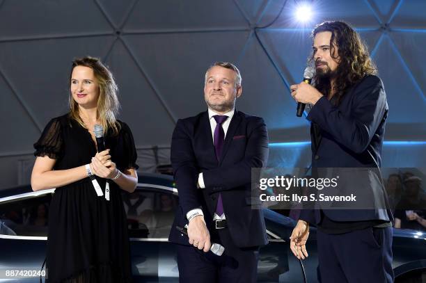 Head of BMW Group Cultural Engagement Thomas Girst and Studio Drift artists Lonneke Gordijn and Ralph Nauta speak onstage at the World Premiere Of...