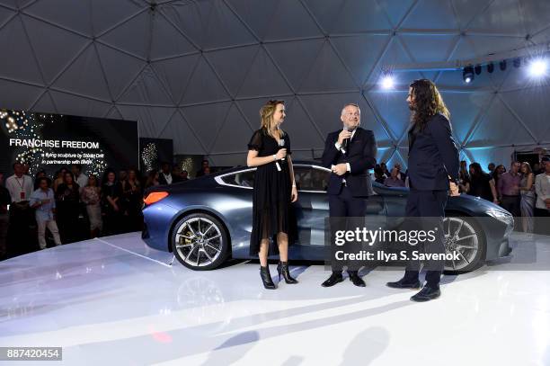 Head of BMW Group Cultural Engagement Thomas Girst and Studio Drift artists Lonneke Gordijn and Ralph Nauta speak onstage at the World Premiere Of...