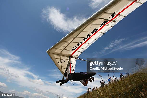 Nenor Roto of Brazil takes off from the Aspres Longeane hill during the 17th FAI World Hang Gliding Championships on June 29, 2009 in...