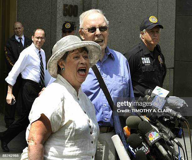 Victims Judith Welling and DeWitt Clinton Baker speak to the media as they leave the United States Courthouse in New York June 29, 2009 after Bernard...