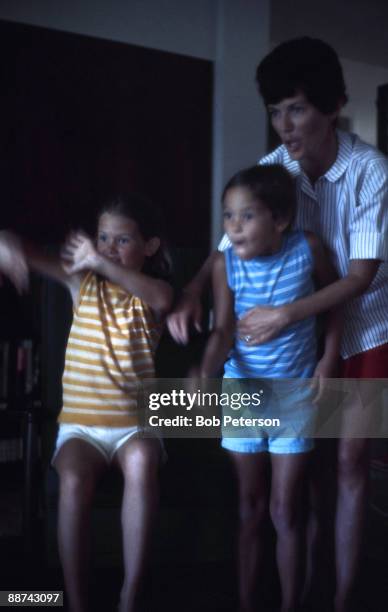 During NASA's Apollo 11 mission to the moon, Pat Collins watches television coverage with her daughters, Kate and Ann, July 1969. Michael Collins,...