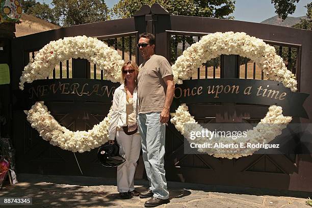 Fans gather in front of the entrance to Michael Jackson's Neverland Ranch June 28, 2009 in Los Olivos, California.