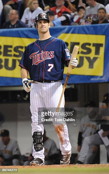 Joe Mauer of the Minnesota Twins leaves the dugout during an MLB game against the Pittsburgh Pirates at the Hubert H. Humphrey Metrodome, June 16,...