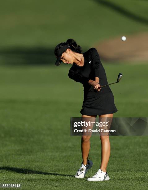 Muni He of China plays her third shot on the par 5, 10th hole during the second round of the 2017 Dubai Ladies Classic on the Majlis Course at The...