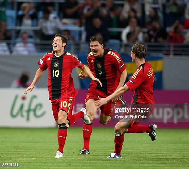 Mesut Ozil of Germany celabrates scoring during the UEFA U21 European Championships Final match between England and Germany at the New Stadium on...