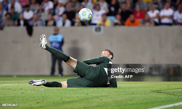 England's goalkeeper Scott Loach fails to get control of the 2-0 shot from Mesut zil in the U21 European Championship final football match Germany...