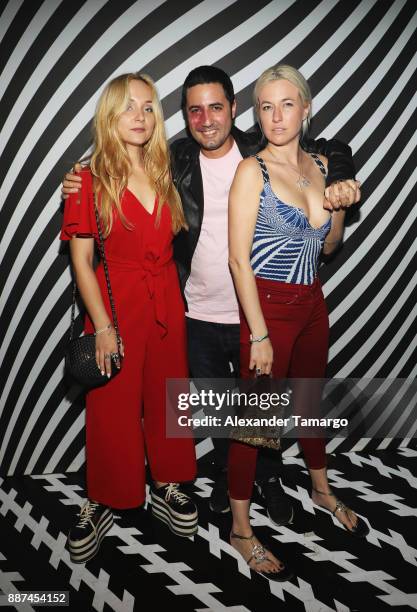 Radostina Docheva, Julio Mario Santo Domingo, and Natalie White attend Prada Double Club Miami, A Carsten Holler Project at Ice Palace Film Studios...