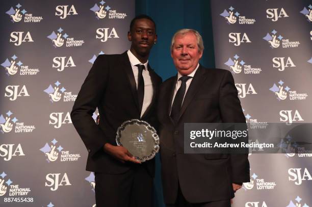 Reece Prescod receives The Peter Wilson Trophy for international newcomer from Brendan Foster during The SJA British Sports Awards 2017 at the Tower...