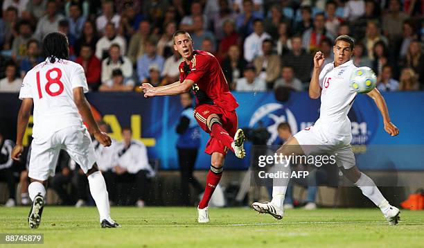 Germany's Sandro Wagner shoots and scores between England's Michael Mancienne and Jack Rodwell in their Under 21 European Championship final football...