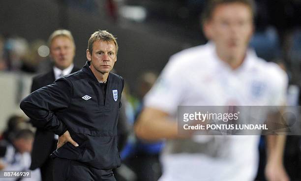 Coach of England's Under 21 football team Stuart Pearce looks disappointed at the end of their Under 21 European Championship final soccer against...