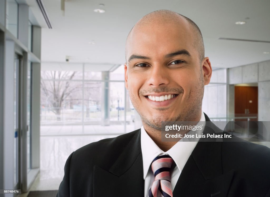 Hispanic businessman smiling