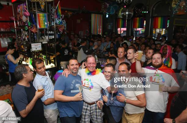 Patrons inside the Stonewall Hotel applaud the passing of the Gay Marriage Bill on December 7, 2017 in Sydney, Australia. The historic bill was...