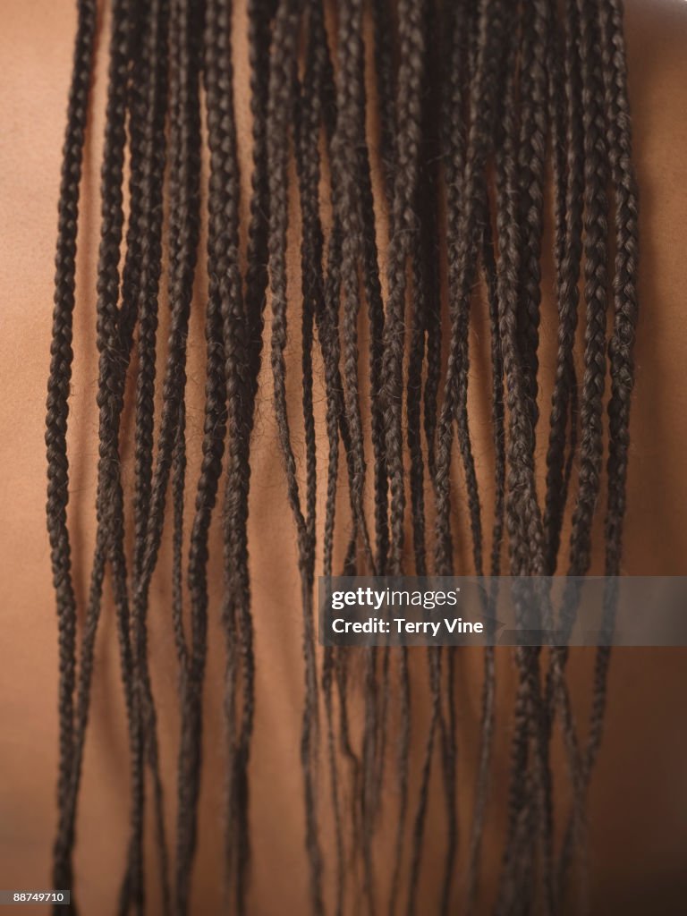 Close up of African woman's long braids