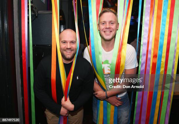 Rob Tollan and Andrew Killen pose inside the Stonewall Hotel on December 7, 2017 in Sydney, Australia. The historic bill was passed on the final day...