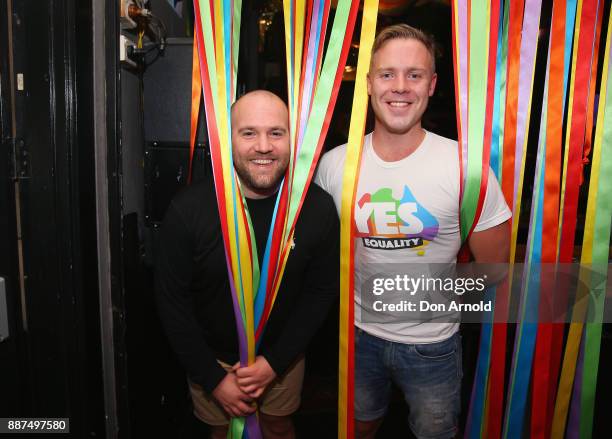 Rob Tollan and Andrew Killen pose inside the Stonewall Hotel on December 7, 2017 in Sydney, Australia. The historic bill was passed on the final day...