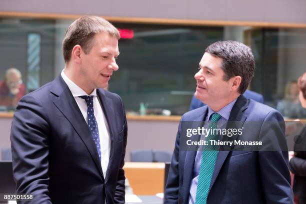 Lithuanian Finance Minister Vilius Sapoka is talking with the Latvian Finance Minister Dana Reizniece-Ozola prior an EU EcoFin Ministers meeting on...