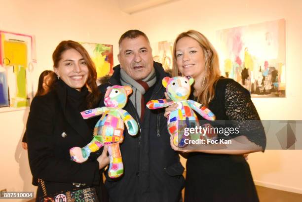 Caterina Murino, Jean Marie Bigard and Caroline Faindt attend Caroline Faindt Exhibition Preview at Espace Reduit on December 6, 2017 in Paris,...