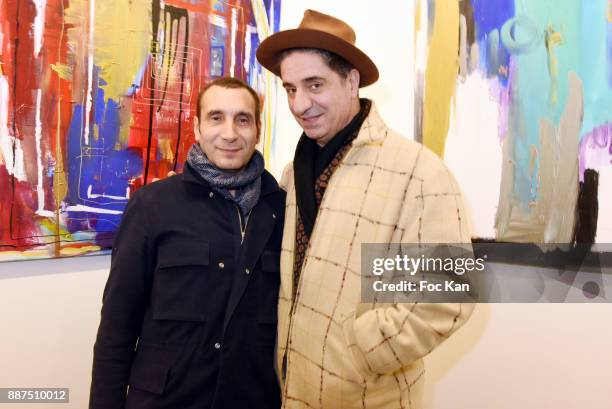 Actors Zinedine Soualem and Simon Abkarian attend Caroline Faindt Exhibition Preview at Espace Reduit on December 6, 2017 in Paris, France.