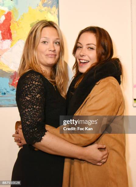 Actress Dounia Coesens and painter Caroline Faindt attend Caroline Faindt Exhibition Preview at Espace Reduit on December 6, 2017 in Paris, France.