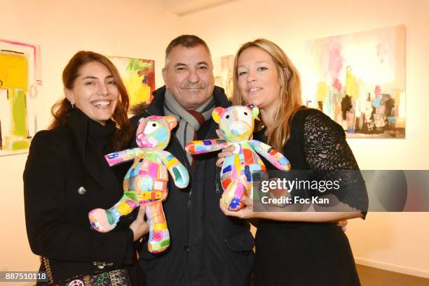 Caterina Murino, Jean Marie Bigard and Caroline Faindt attend Caroline Faindt Exhibition Preview at Espace Reduit on December 6, 2017 in Paris,...