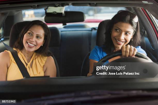 friends driving in car together - west new york new jersey stock-fotos und bilder