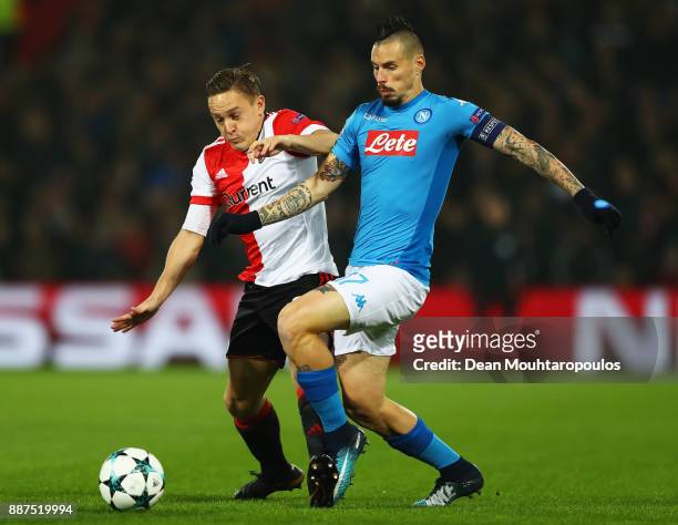 Jens Toornstra of Feyenoord battles for the ball with Marek Hamsik of Napoli during the UEFA Champions League group F match between Feyenoord and SSC...