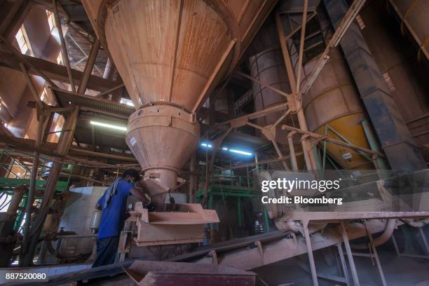 An employee works in the spray dryer department at the Shabbir Tiles & Ceramics Ltd. Production facility in Karachi, Pakistan, on Wednesday, Dec. 6,...
