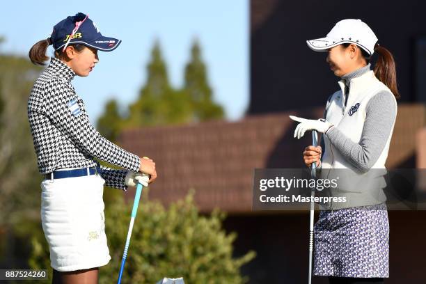 Siho Kawasaki and Shina Kanazawa of Japan talks during the first round of the LPGA Rookie Tournament at Great Island Club on December 7, 2017 in...