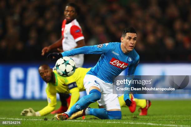 Jose Callejon of Napoli battles for the ball with Goalkeeper, Kenneth Vermeer of Feyenoord during the UEFA Champions League group F match between...