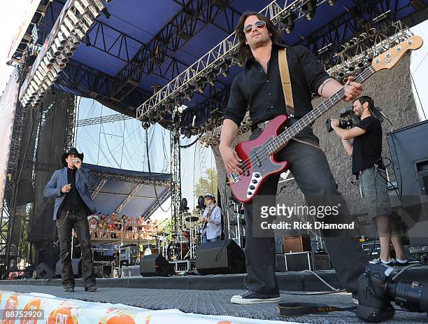 Ryder Lee 9In Hat) and Manny Medina of The Lost Trailers perform during Country Stampede 2009 at Tuttle Creek State Park on June 28, 2009 in...